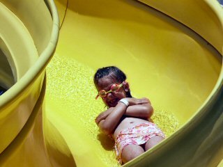 Brinn enjoying the Mickey Pool Slide
